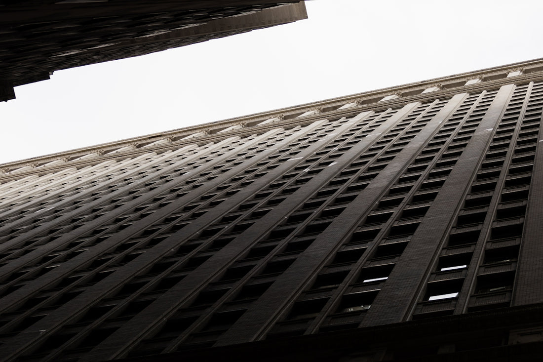 a tall building with a clock on the side of it