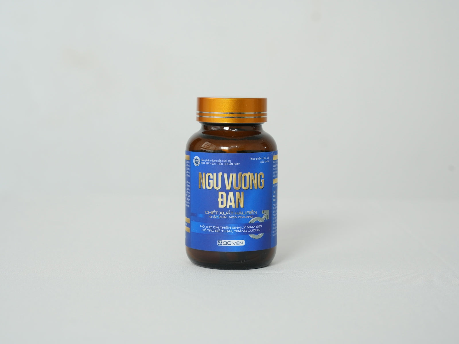 a bottle of vitamin supplement on a white background