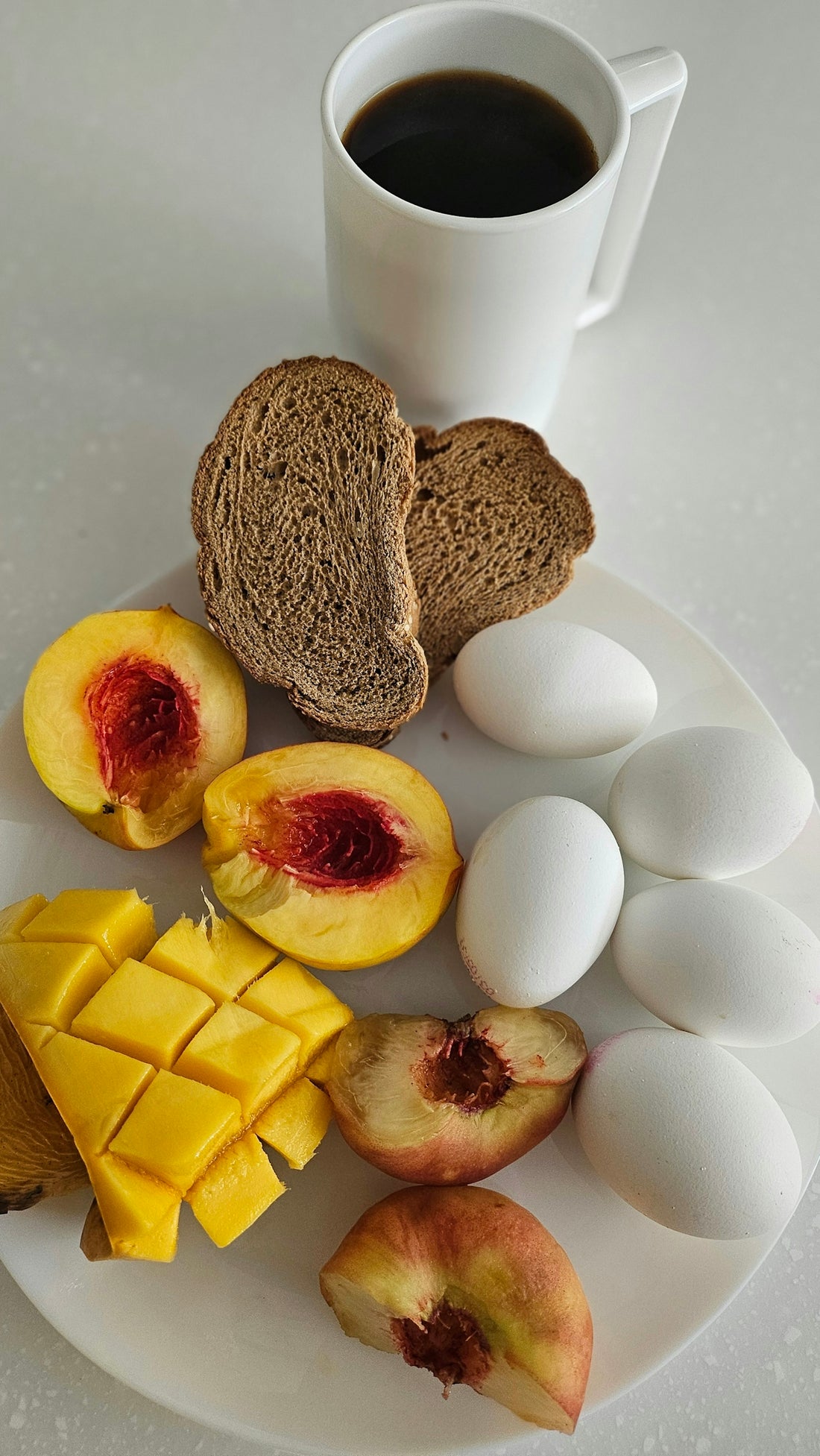A white plate topped with different types of food